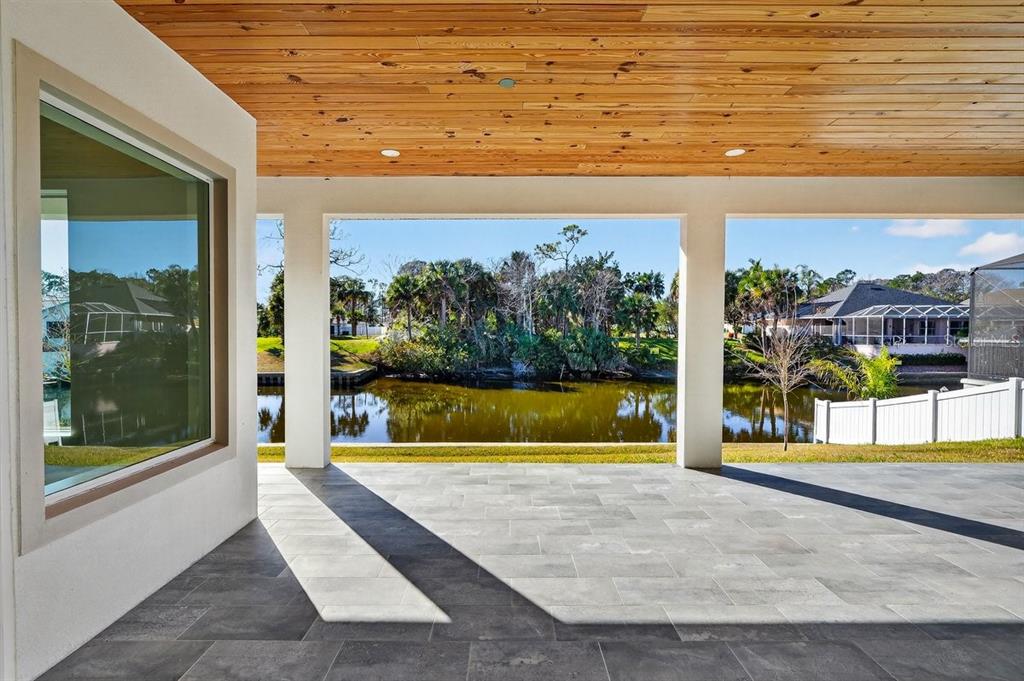 7 Crandon Court Palm Coast, FL 32137 - Photo 61 of 72 a view of swimming pool with a sitting area