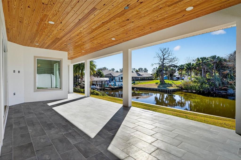 7 Crandon Court Palm Coast, FL 32137 - Photo 63 of 72 a view of swimming pool with outdoor seating