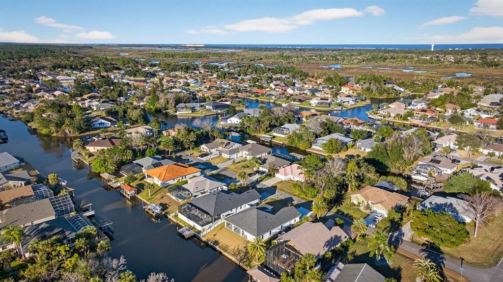 7 Crandon Court Palm Coast, FL 32137 - Photo 69 of 72 an aerial view of residential building with parking space
