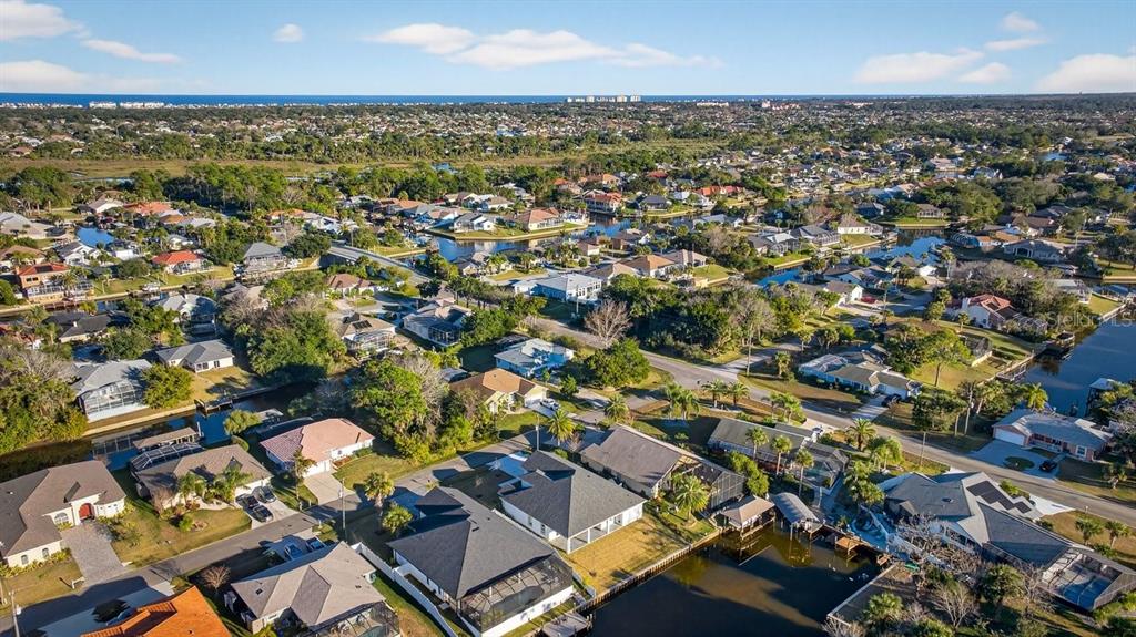 7 Crandon Court Palm Coast, FL 32137 - Photo 71 of 72 an aerial view of a city with lots of residential buildings