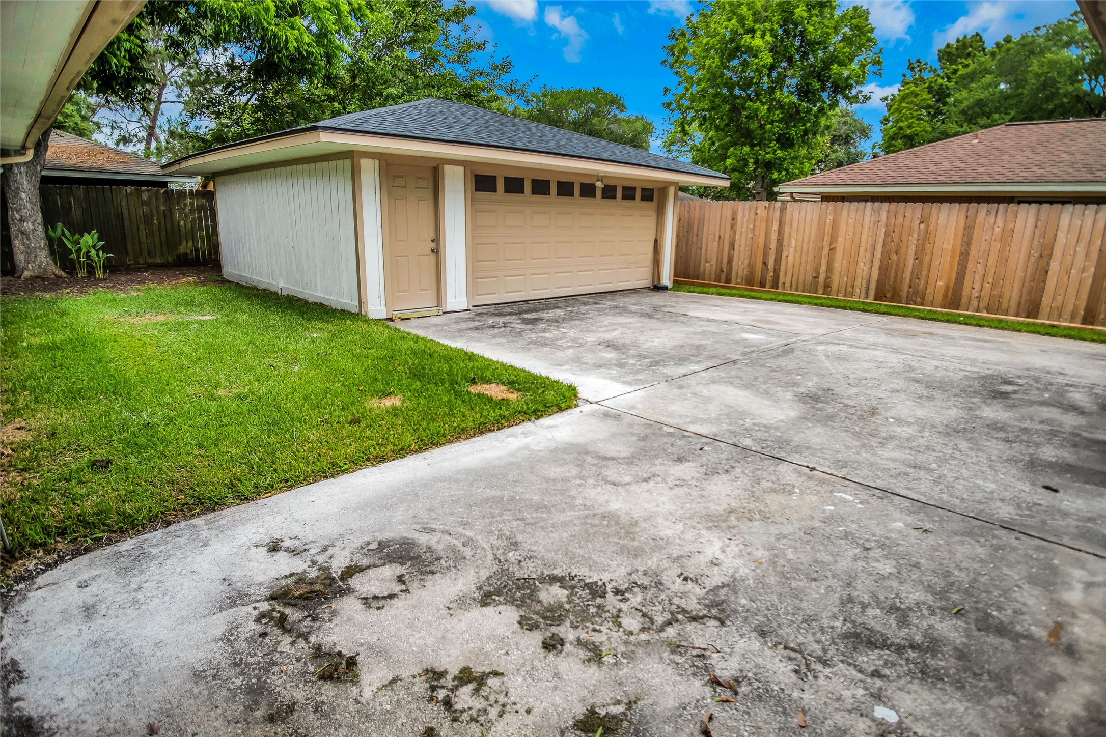 1715 Capstan Road Houston, TX 77062 - Photo 36 of 40 a view of a house with a yard and fence
