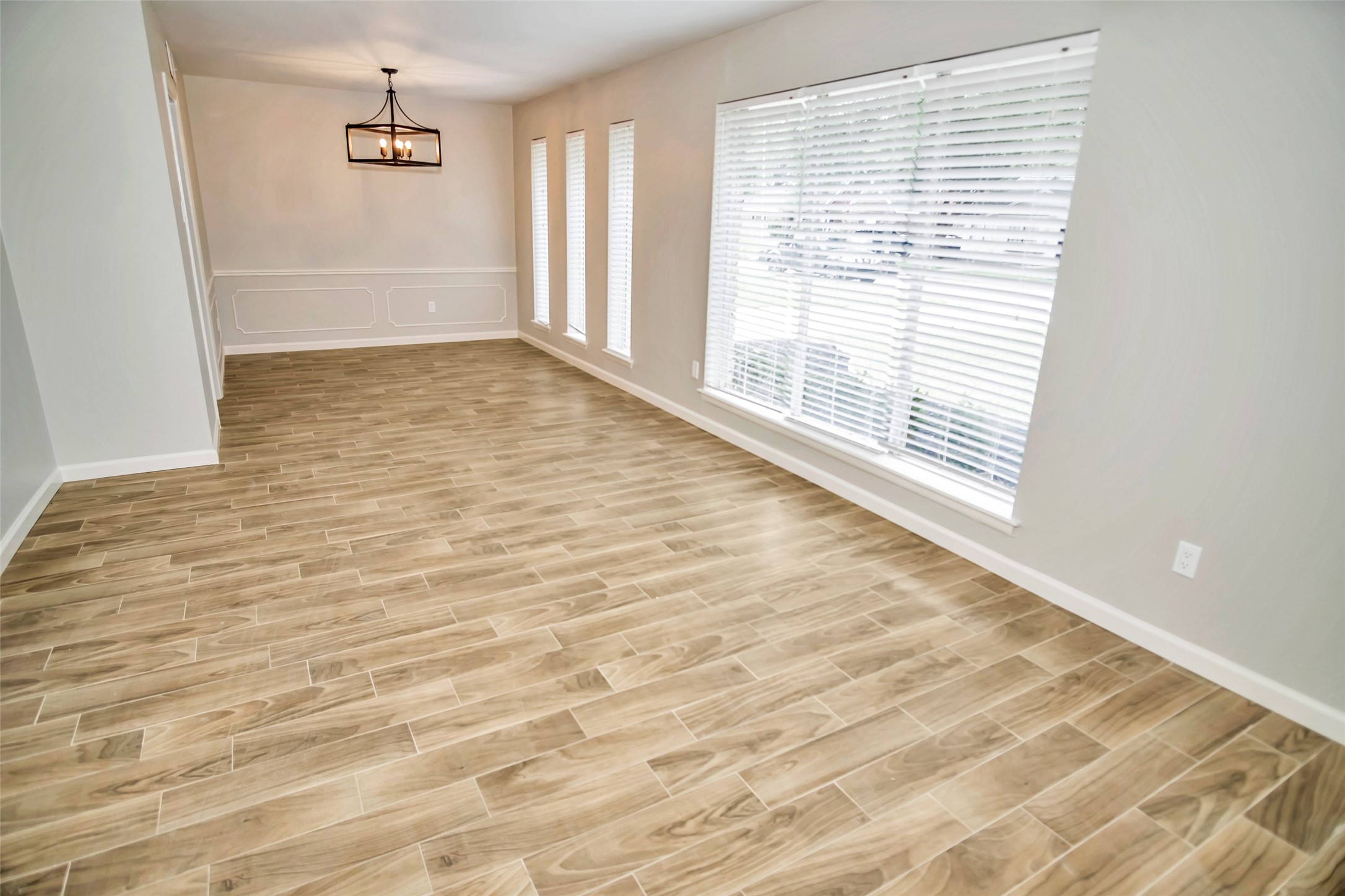 1715 Capstan Road Houston, TX 77062 - Photo 6 of 40 a view of an empty room with a window