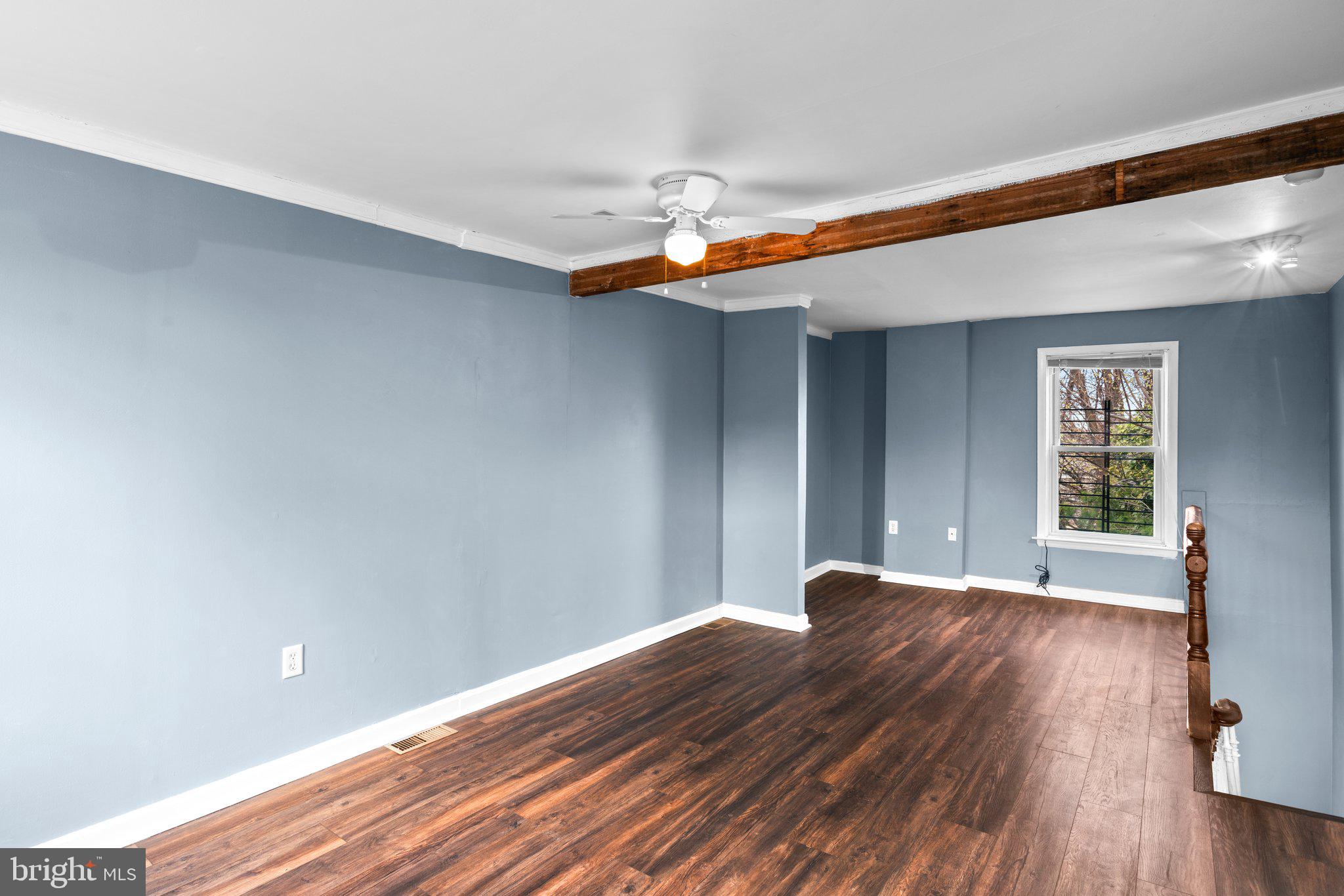 106 Scott Street Baltimore, MD 21201 - Photo 22 of 40 a view of empty room with wooden floor