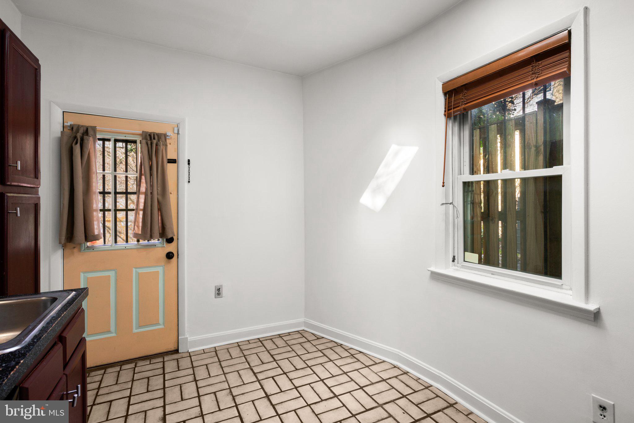 106 Scott Street Baltimore, MD 21201 - Photo 30 of 40 a view of an entryway with a window