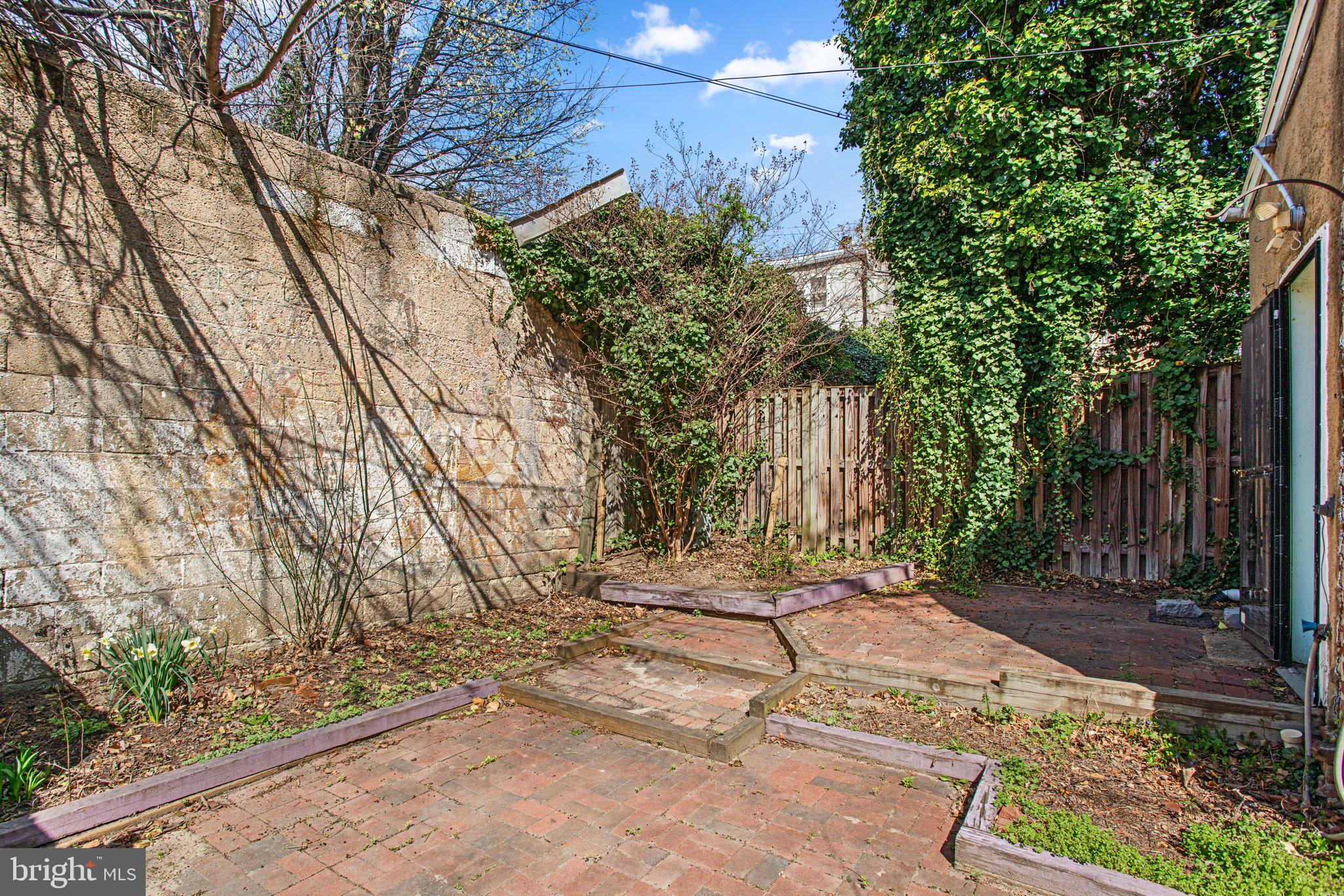 106 Scott Street Baltimore, MD 21201 - Photo 33 of 40 a view of backyard with green space