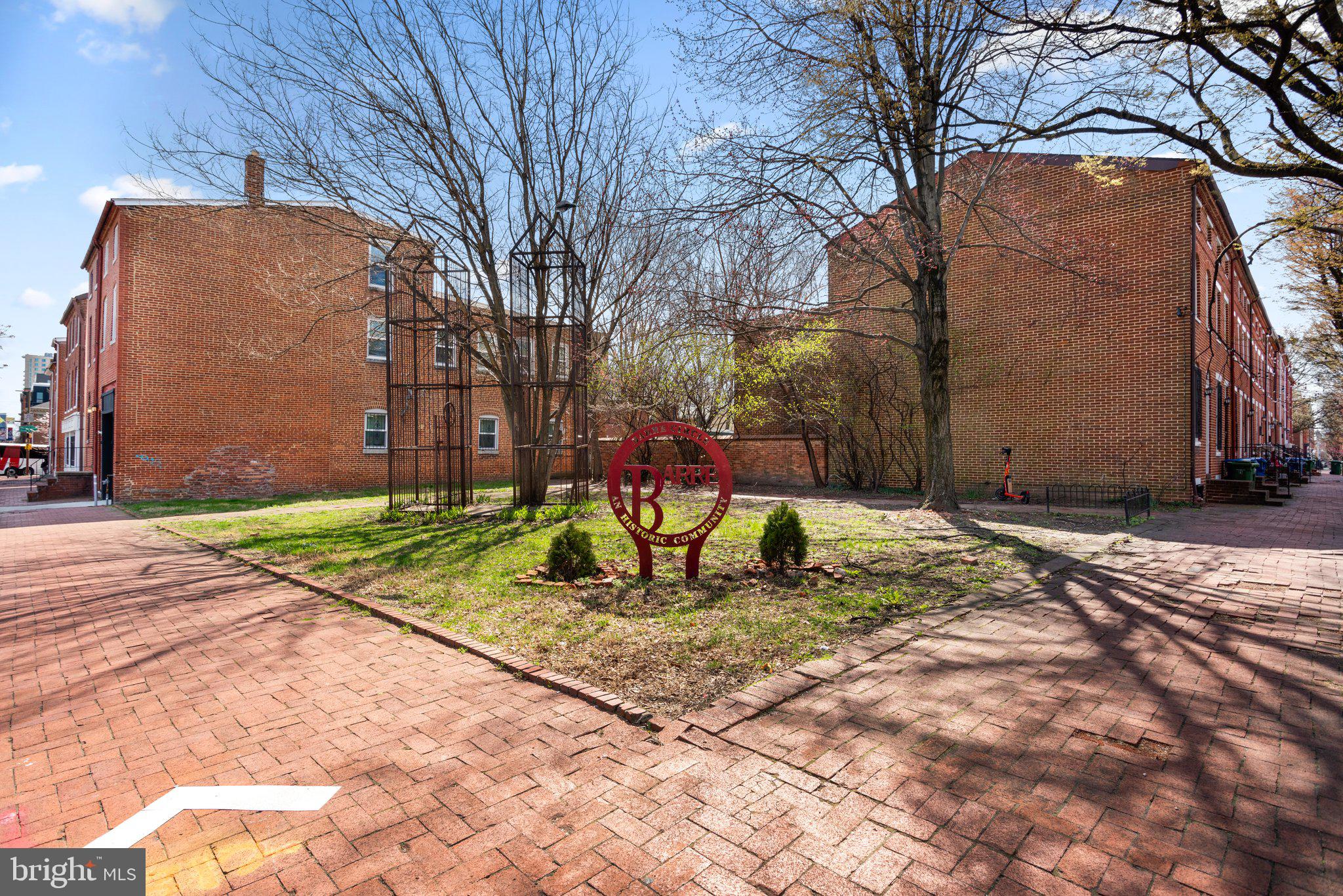 106 Scott Street Baltimore, MD 21201 - Photo 35 of 40 a view of a backyard with a tree