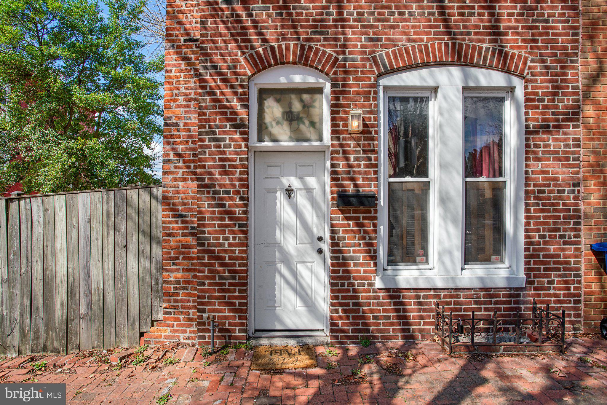 106 Scott Street Baltimore, MD 21201 - Photo 5 of 40 a front view of a house with a door