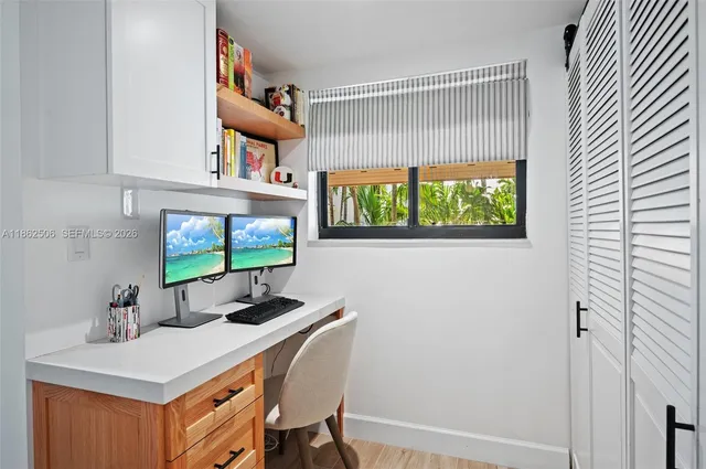 a room with furniture and a flat screen tv