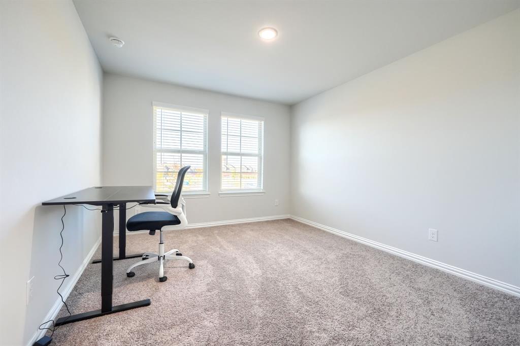 1309 Buttercup Road Prosper, TX 75078 - Photo 32 of 36 an empty room with windows