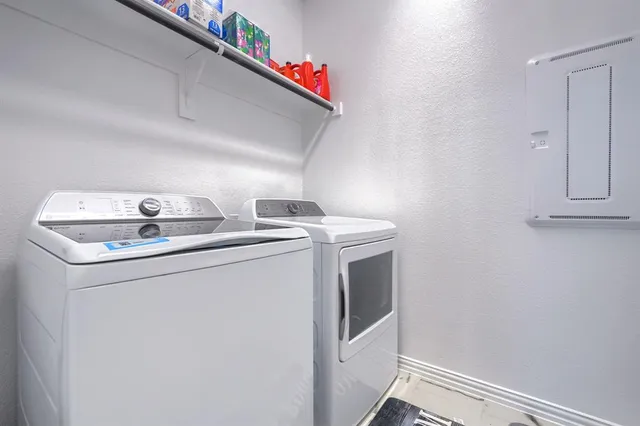 a view of swimming pool with a balcony