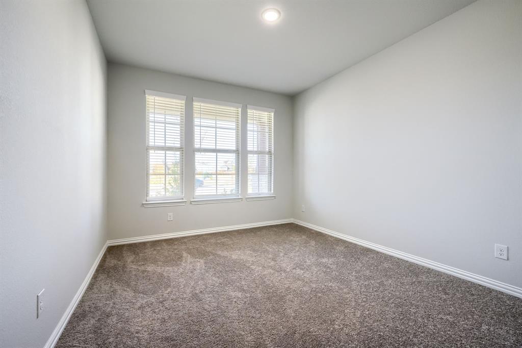 1309 Buttercup Road Prosper, TX 75078 - Photo 4 of 36 an empty room with a window
