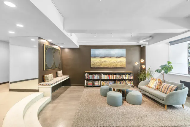 a bedroom with furniture and a couch