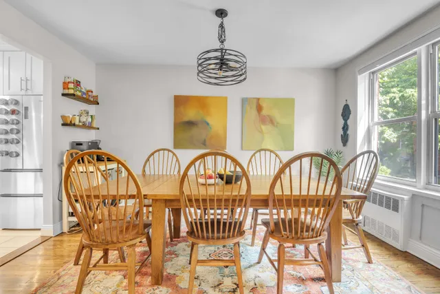 a view of a dining room with furniture window and outside view