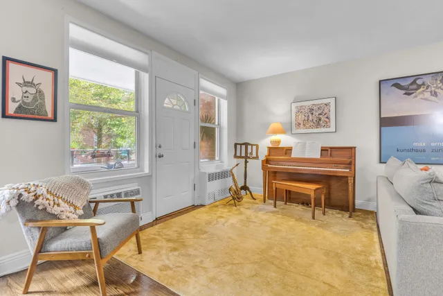 a bedroom with a bed and a desk