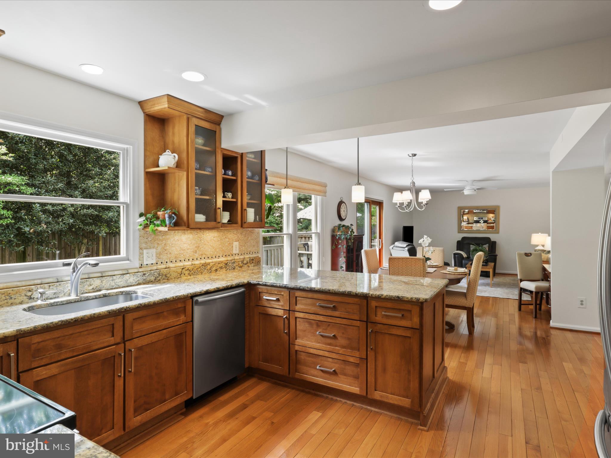12021 Heather Down Drive Herndon, VA 20170 - Photo 16 of 47 a kitchen with a sink and cabinets