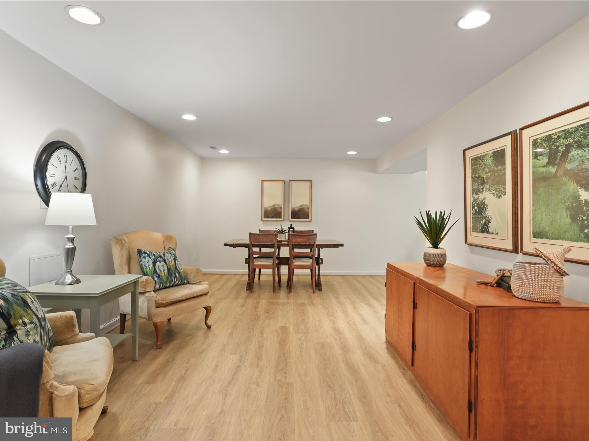 12021 Heather Down Drive Herndon, VA 20170 - Photo 20 of 47 a living room with furniture and wooden floor