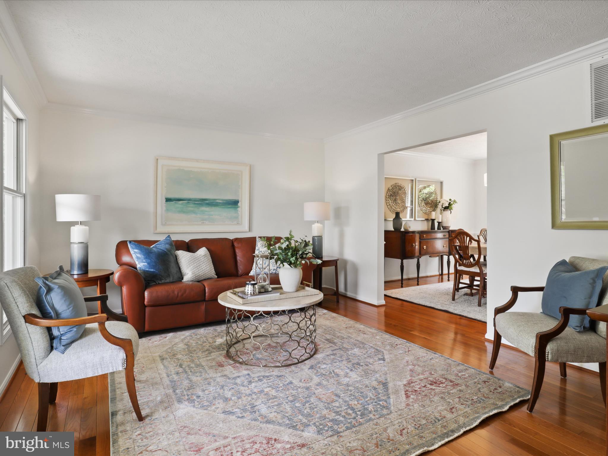 12021 Heather Down Drive Herndon, VA 20170 - Photo 5 of 47 a living room with furniture and wooden floor