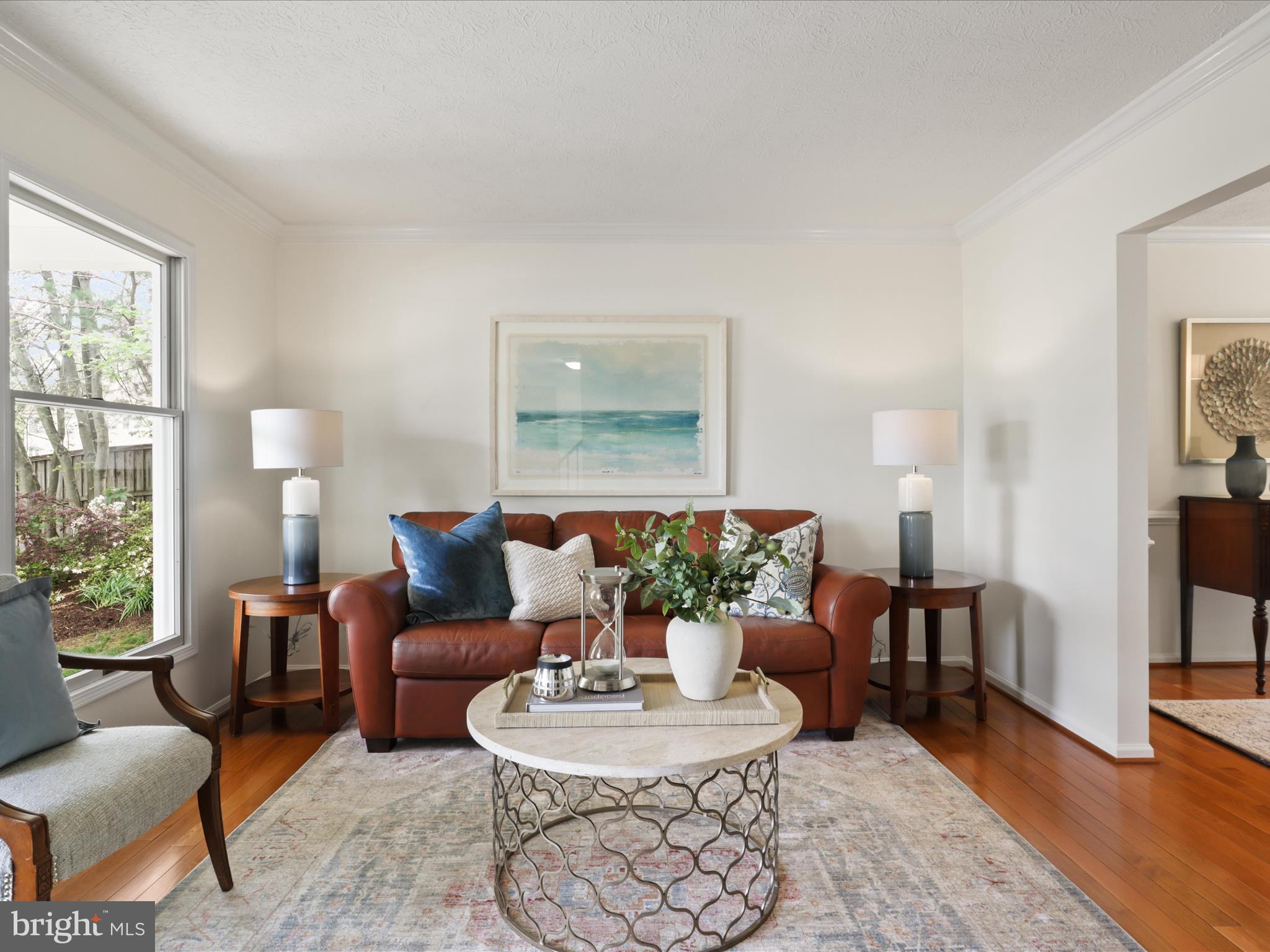 12021 Heather Down Drive Herndon, VA 20170 - Photo 6 of 47 a living room with furniture and a table
