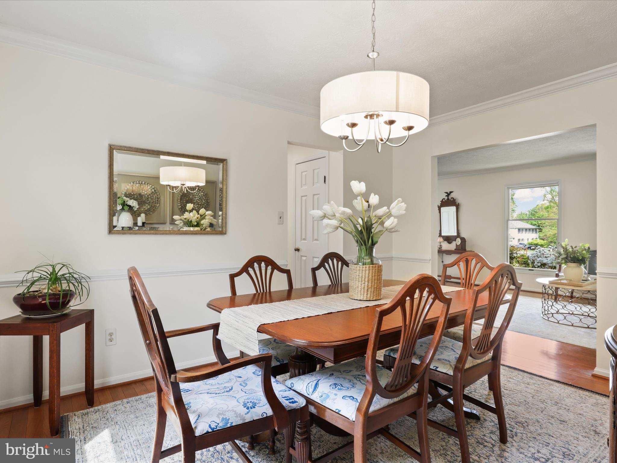 12021 Heather Down Drive Herndon, VA 20170 - Photo 10 of 47 a dining room with furniture and chandelier
