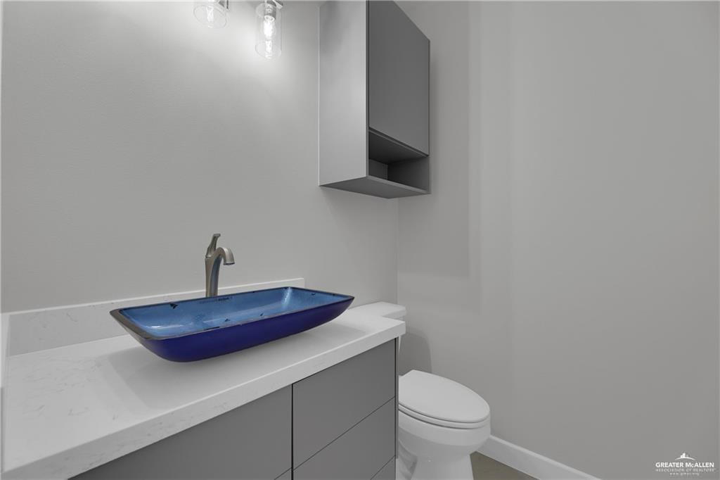 2516 Viola Street Mission, TX 78574 - Photo 11 of 17 Bathroom with vanity and toilet