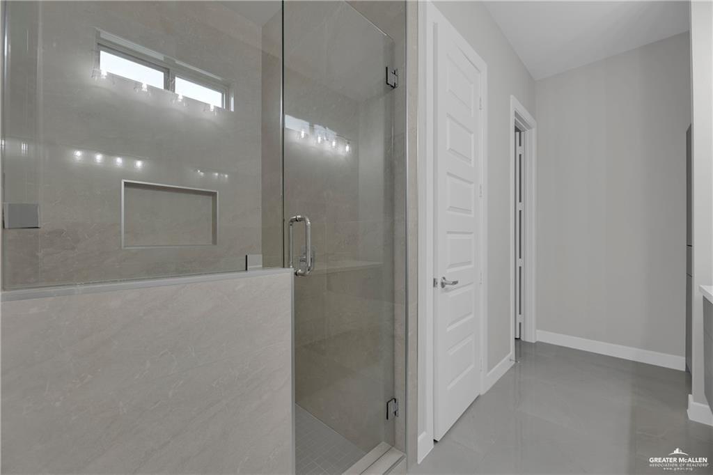 2516 Viola Street Mission, TX 78574 - Photo 12 of 17 Full bathroom featuring a shower stall and light tile patterned floors