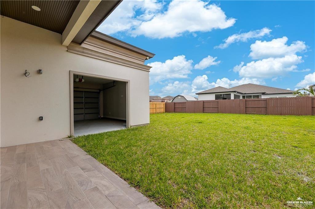 2516 Viola Street Mission, TX 78574 - Photo 16 of 17 Fenced backyard with a patio