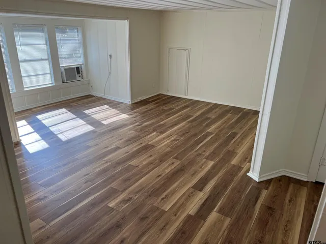a view of an empty room and window