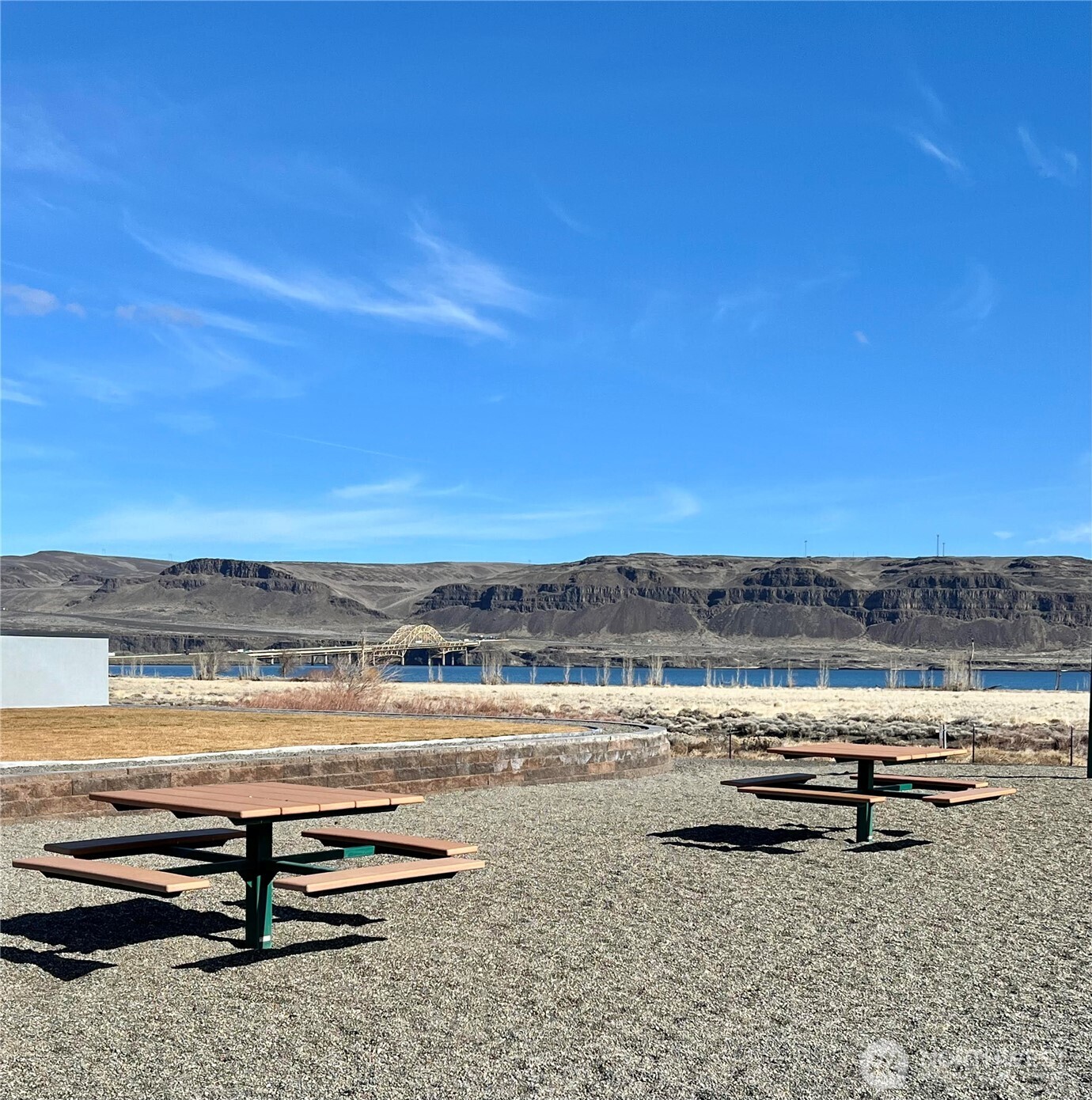 360 Vantage Bay Loop Vantage, WA 98950 - Photo 16 of 18 a view of a lake with a car park in front of it