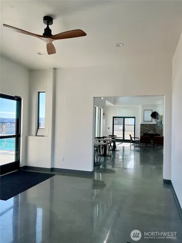 a view of house with outdoor space and sitting area
