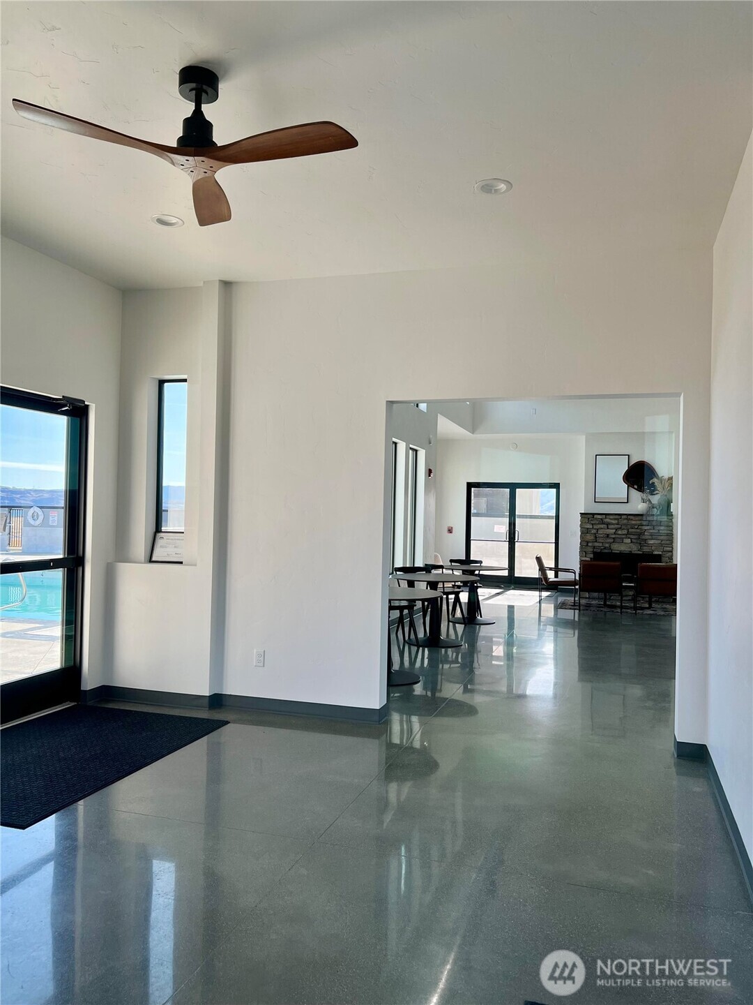 360 Vantage Bay Loop Vantage, WA 98950 - Photo 8 of 18 a view of dining room with hardwood floor and a ceiling fan