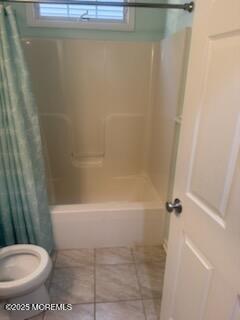 433 West Avenue, Unit 1 Ocean City, NJ 08226 - Photo 17 of 29 a white toilet sitting next to a bath tub