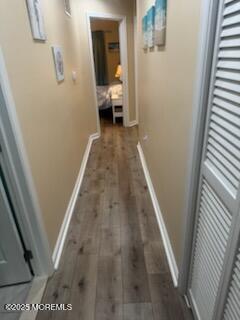 433 West Avenue, Unit 1 Ocean City, NJ 08226 - Photo 2 of 29 a view of a hallway with wooden floor and staircase