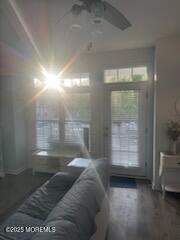 433 West Avenue, Unit 1 Ocean City, NJ 08226 - Photo 25 of 29 a living room with furniture and a glass door