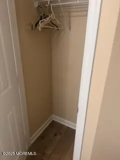 a kitchen with kitchen island a sink stove and white cabinets