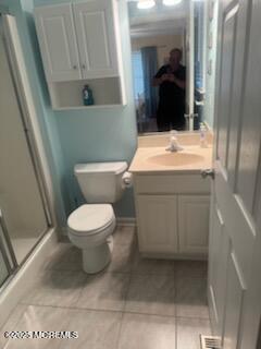 433 West Avenue, Unit 1 Ocean City, NJ 08226 - Photo 7 of 29 a bathroom with a toilet and a sink