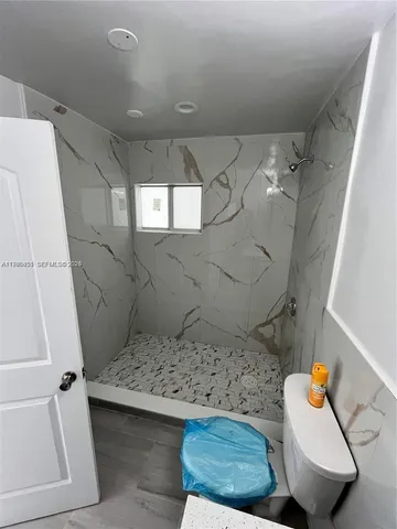 a view of a backyard of the house