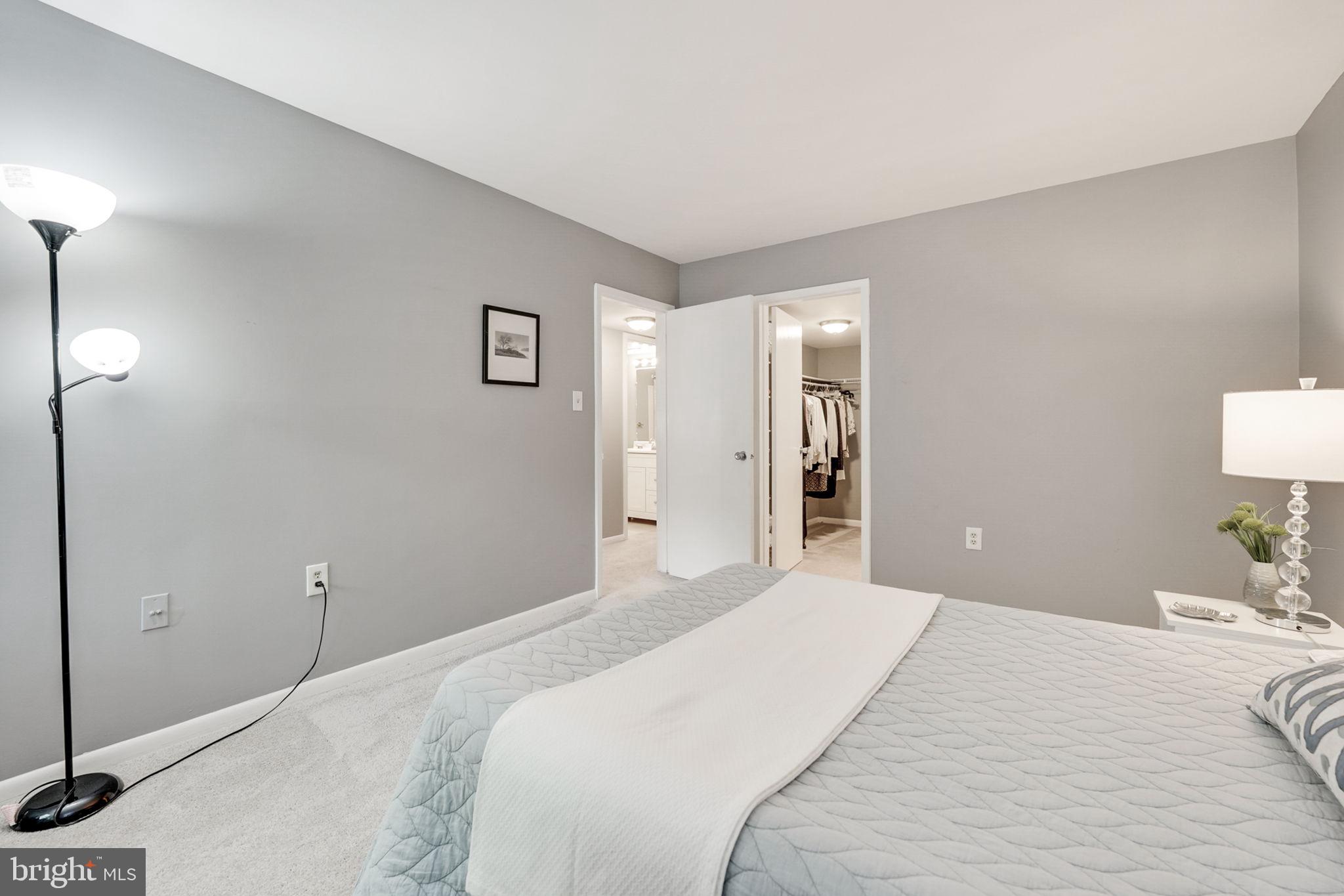 1426 Northgate Square, Unit 142612B Reston, VA 20190 - Photo 14 of 32 large primary bedroom