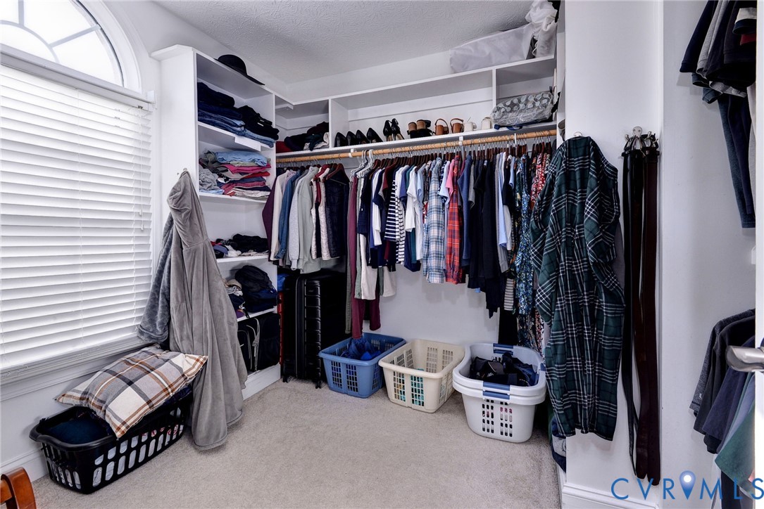 4015 Cold Spring Road Williamsburg, VA 23188 - Photo 30 of 57 Walk-in closet featuring white built-in shelving,