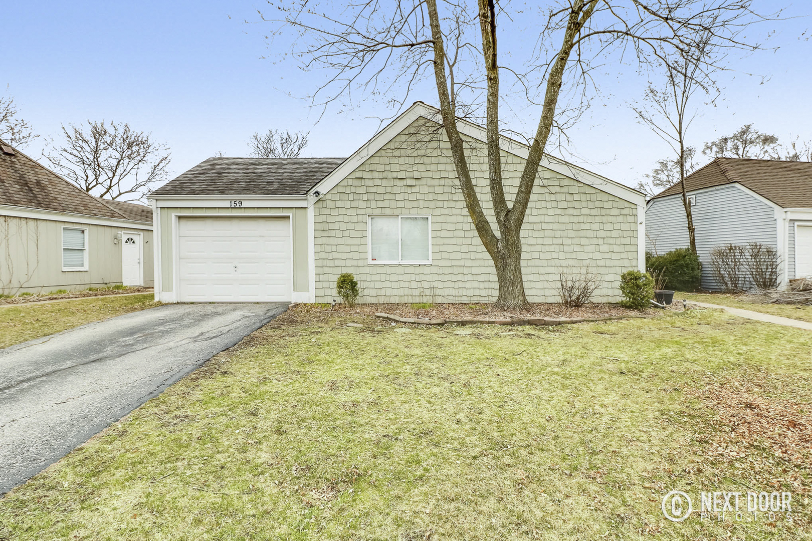 159 Heathgate Road Montgomery, IL 60538 - Photo 1 of 21 a view of a house with a yard