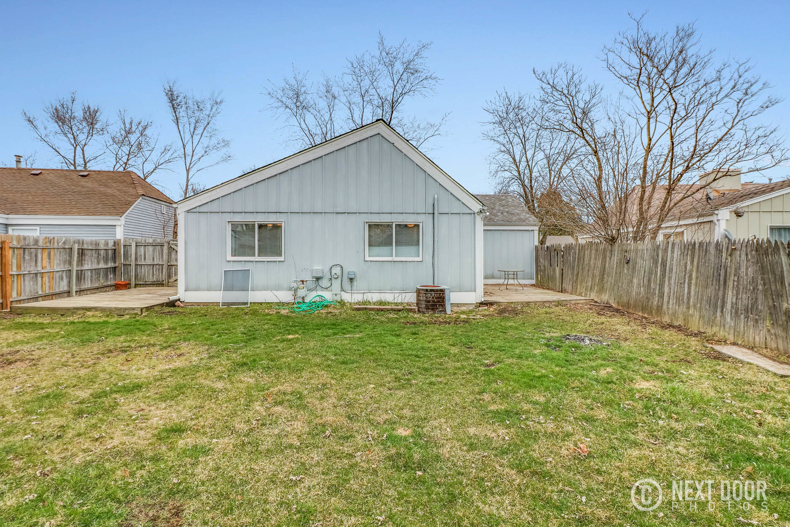 159 Heathgate Road Montgomery, IL 60538 - Photo 18 of 21 a backyard of a house with table and chairs