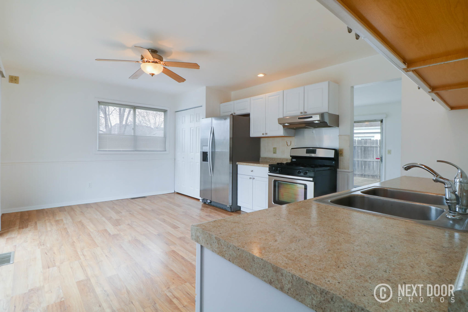 159 Heathgate Road Montgomery, IL 60538 - Photo 5 of 21 a kitchen with kitchen island a sink appliances and cabinets