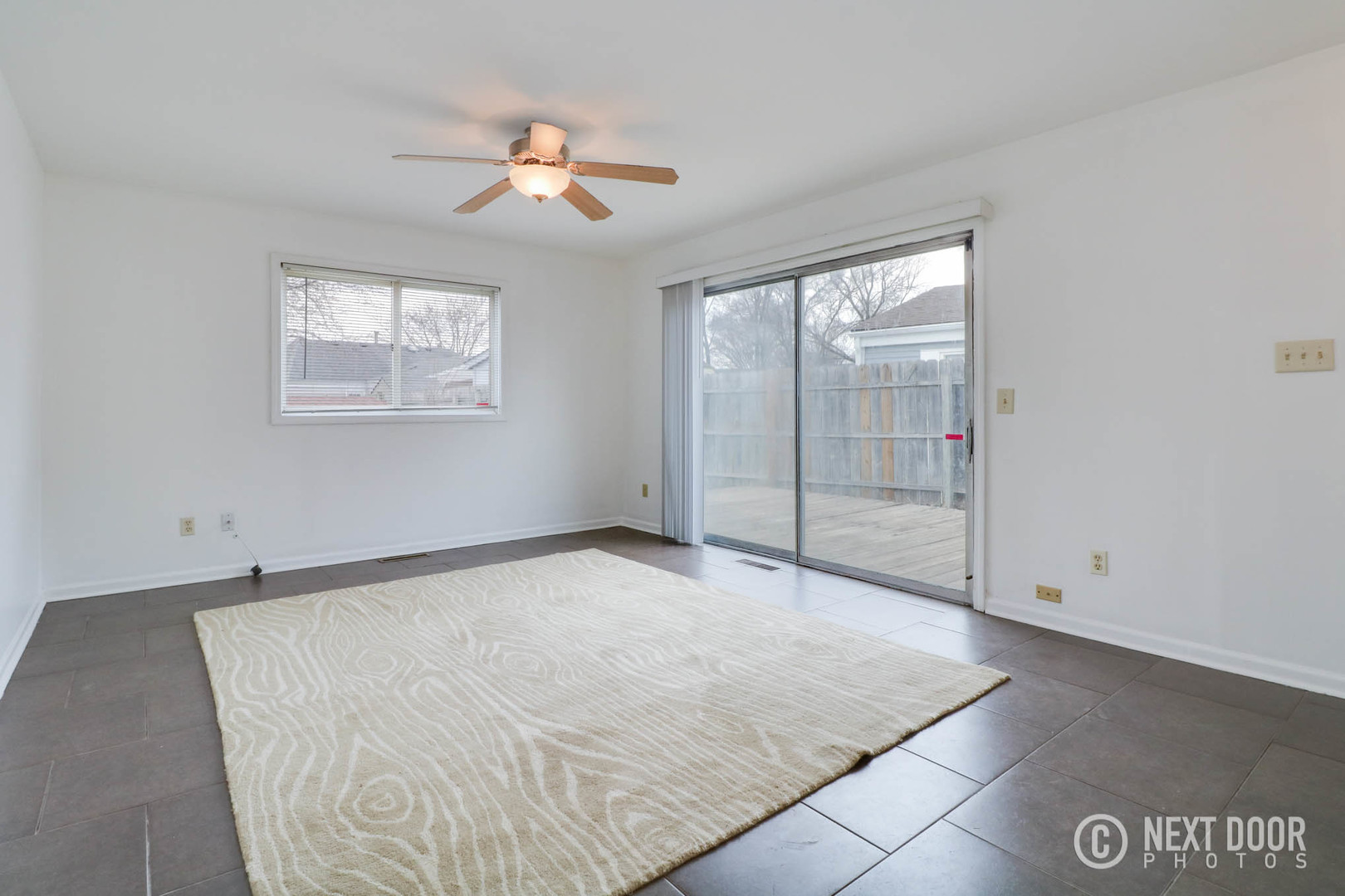 159 Heathgate Road Montgomery, IL 60538 - Photo 7 of 21 an empty room with windows
