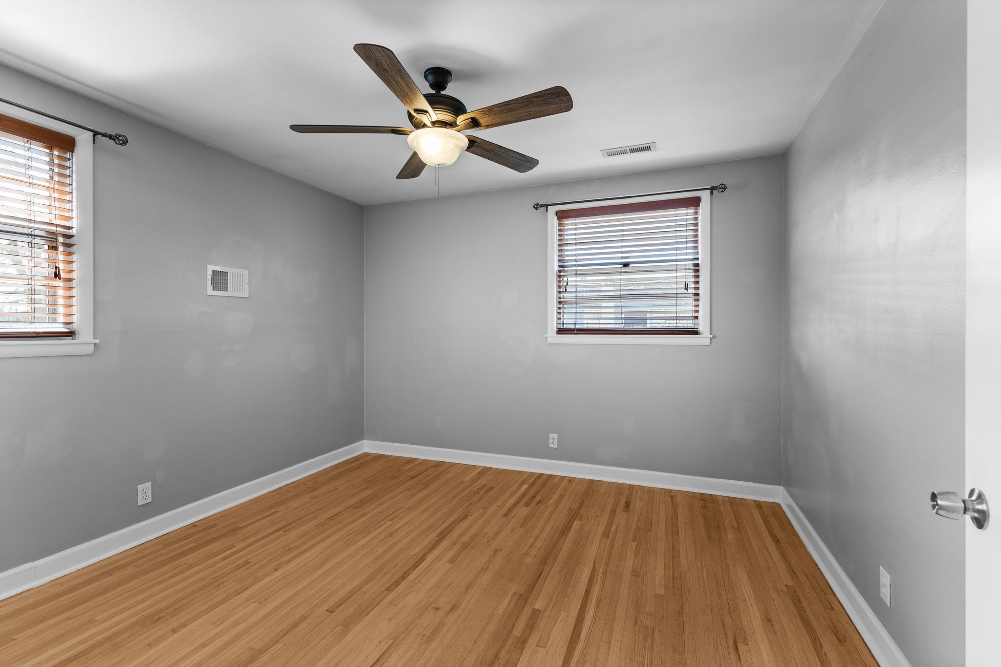 6411 Ranchero Drive Nashville, TN 37209 - Photo 13 of 34 wooden floor in an empty room with a window