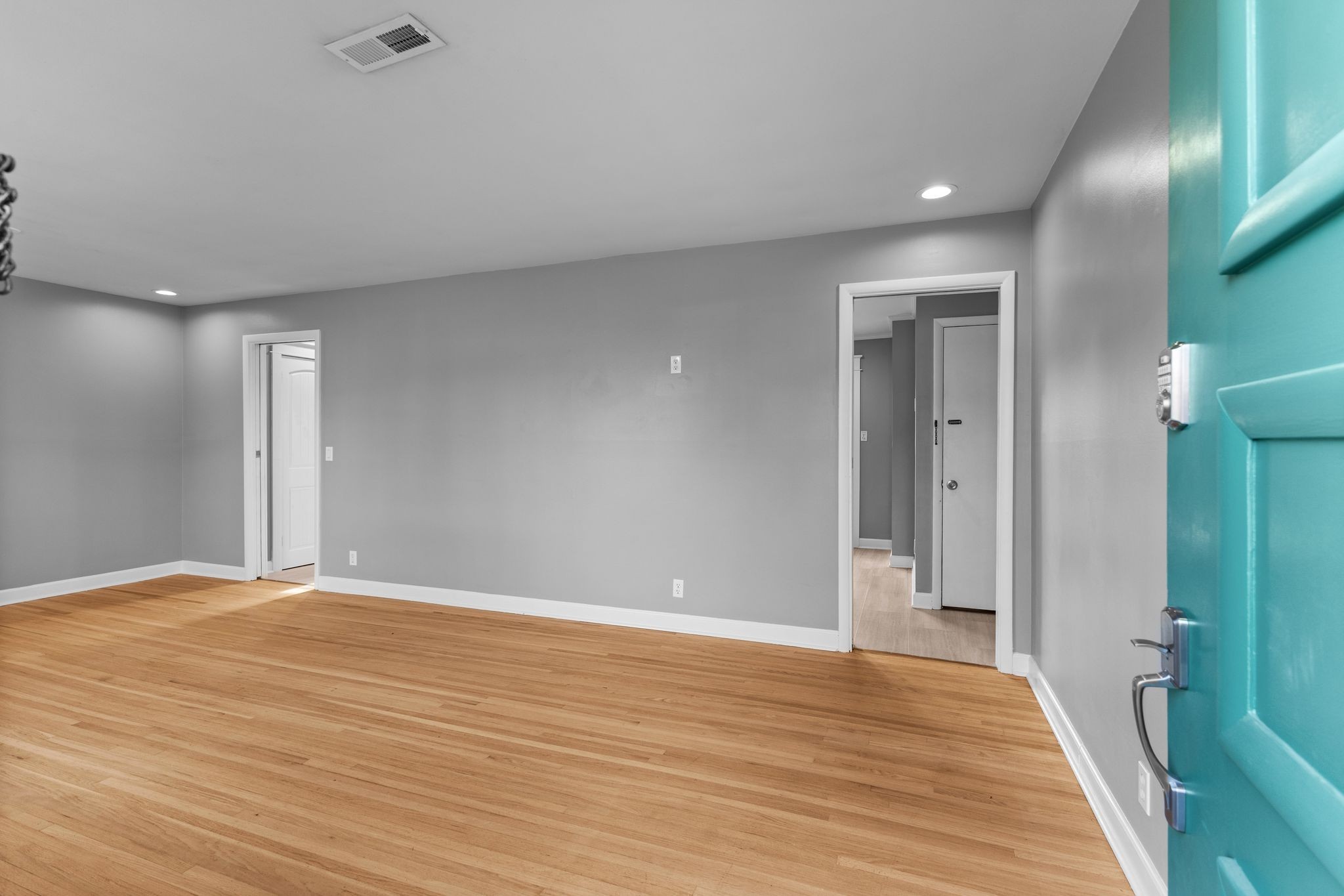 6411 Ranchero Drive Nashville, TN 37209 - Photo 4 of 34 a view of an empty room with wooden floor