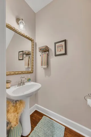 a bathroom with a sink and mirror