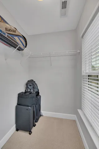 a view of hallway with washer and dryer