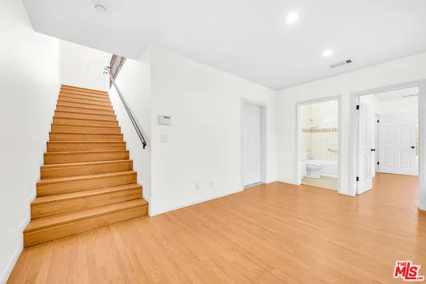 a view of a room with a staircase