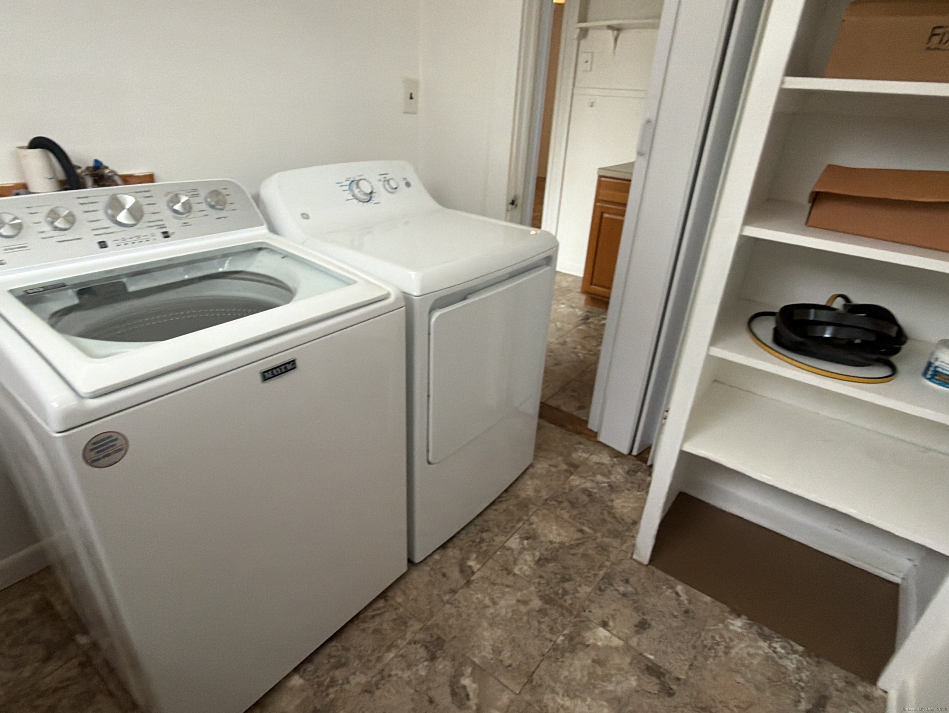 184 Hoffman Street Torrington, CT 06790 - Photo 7 of 12 a utility room with dryer and washer