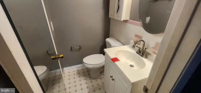 a bathroom with a sink and a toilet