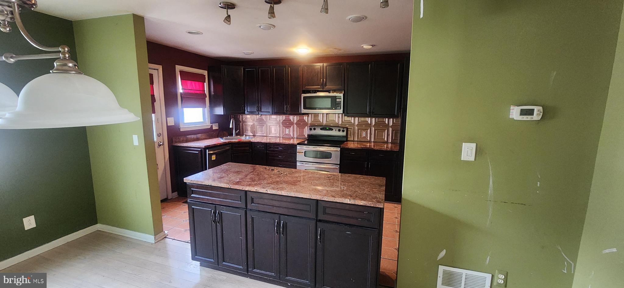 3612 Rockberry Road Baltimore, MD 21234 - Photo 7 of 22 a bathroom with a sink and a mirror